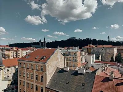 an aerial view of a city with buildings at Penthouse With City Terrace in Prague