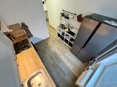 an overhead view of a kitchen with a refrigerator at FH Apartment Letňany in Prague