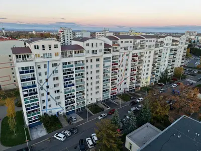 an aerial view of a large white apartment building at FH Apartment Letňany in Prague
