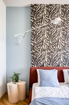 a bedroom with a bed and a kitchen with a counter at Boutique Apartment - 2 Double Beds and Balcony in City Centre by Gravity Prague in Prague