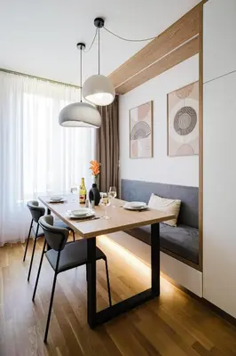 a dining room with a table and chairs at Prague Days - One Bedroom Apartment with Garage Parking in Smíchov City in Prague
