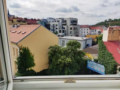 a view of a city from a window at Comfortable 2 Bedroom Flat Free Parking Shared Kitchen in Prague
