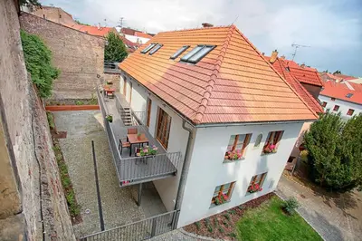 an aerial view of a building with an orange roof at Penzion Dobré Časy in Poděbrady