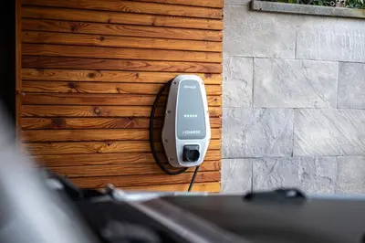 a wall with an electronic device attached to it at Modern Nature Retreat w Pool, PS5 & Hot Tube in Sázava
