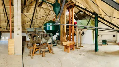 a room with a machine in a building at Černokostelecký pivovar in Kostelec nad Černými Lesy