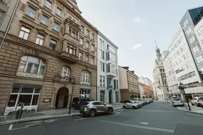 a car parked on a city street with buildings at LIL Apartment with Tyn Cathedral View, Parking & AC in Prague