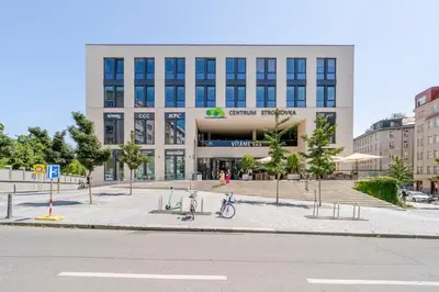 a building with a bike parked in front of it at Blueground Holešovice view nr Vltava PRG-60 in Prague