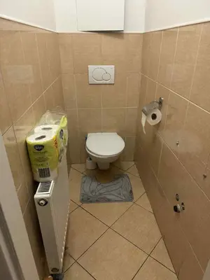 a small bathroom with a toilet in a stall at YCZ Praha in Prague