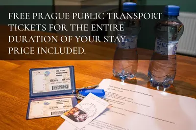 a table with two bottles of water and papers at Negroni Apartment in Prague
