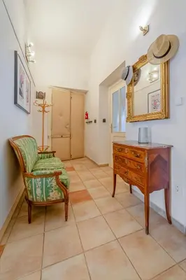 a room with a desk and a chair and a mirror at Charming Apartment in the Heart of Prague by Rentez in Prague