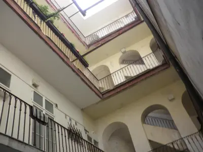 an empty hallway with a skylight in a building at Apartment Paradise Michalská in Prague