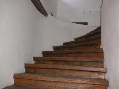 a stairway with wooden steps in a house at Apartment Paradise Michalská in Prague