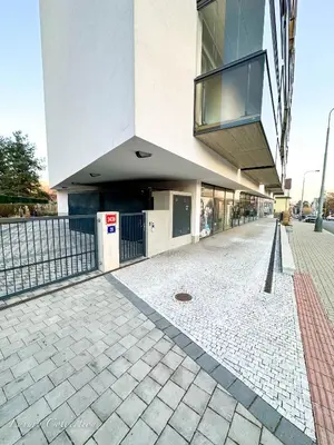 a building with a walkway in front of it at Incredible Luxury Apt with Garage and Tram Station in Prague