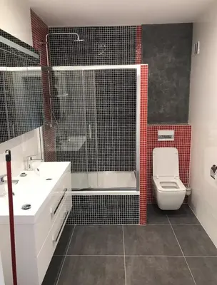 a bathroom with a shower and a toilet and a sink at Apartment in Prague in a quiet location close to the center in Prague