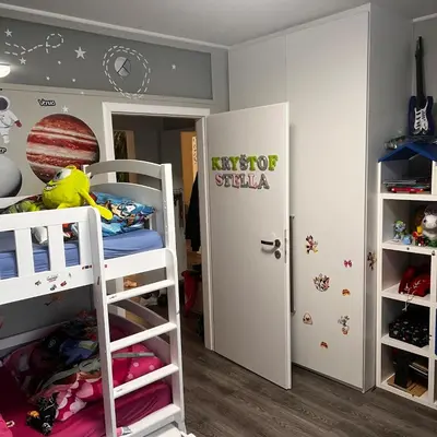 a bedroom with two bunk beds and a door at Apartment in Prague in a quiet location close to the center in Prague