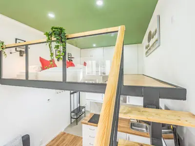 a room with a loft with a bed in it at Apartment Čelakovsky-3 by Interhome in Prague