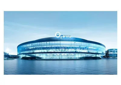 a large blue building with a sign on it at Prague Centre Luxury Apartment & Parking in Prague