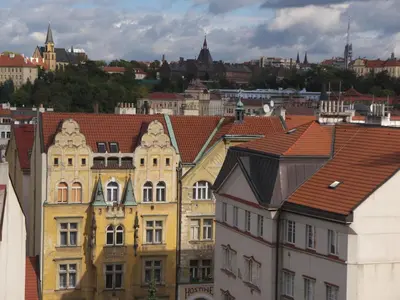 a view of a city with buildings and roofs at Stela's Apartments - Vysehrad in Prague