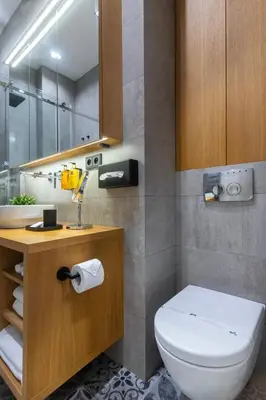 a bathroom with a toilet and a sink at Stylish Apartment in Prague's Historic Centre in Prague