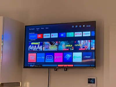 a flat screen tv hanging on a wall at Serene Apartment near Wenceslas Sq & Main Station in Prague