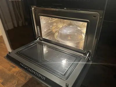 an oven with a dish inside of it at 2 BR Designer Apartment in Old Town in Prague
