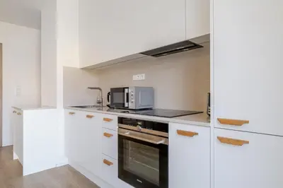 a bathroom with a toilet and a sink at Blueground Prague 7 furnished close to offices PRG-12 in Prague