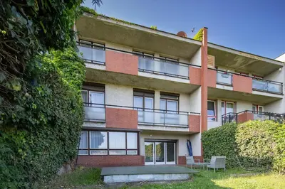an external view of an apartment building at Spacious House with Garden 15 min walk from Castle in Prague