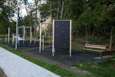 a playground with a climbing equipment in a park at Rotunda Residence - with free weekend parking in Prague