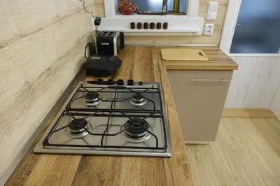 a stove top oven in a kitchen with a counter at Apartmán U Černého Beránka in Prague