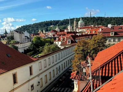 a view of a city with buildings and roofs at Apartmán U Černého Beránka in Prague