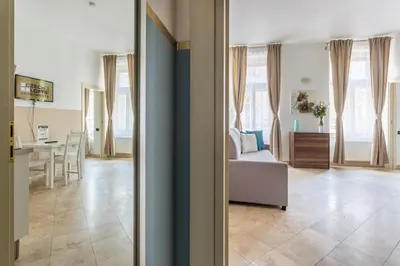 a living room with a couch and a table at Legerova 33 Apartments in Prague