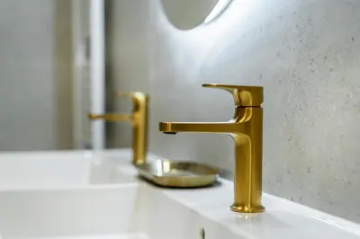 a bathroom with a white toilet and a shower at Rentero Riverside Serenity Residence - Prague 7 in Prague