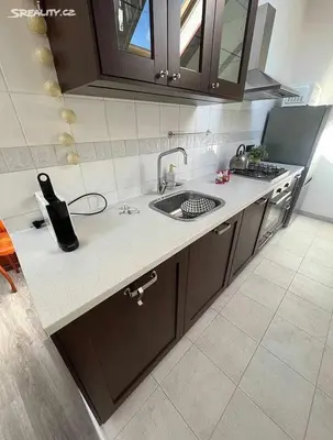 a kitchen with a sink and a counter top at Room for 2 in Central Prague 8 Apartment in Prague