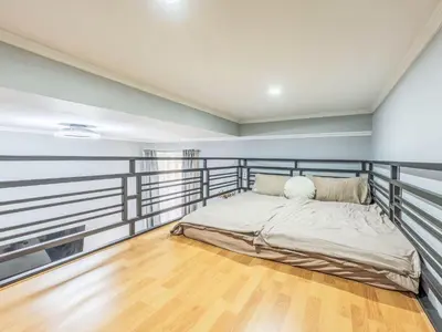 a bedroom with a bed on a balcony at Apartment Washington-6 by Interhome in Prague