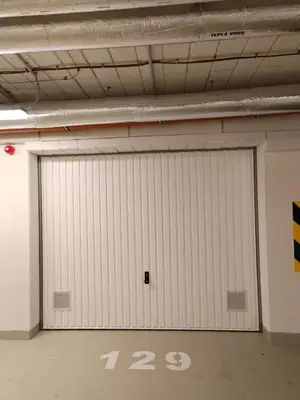 a garage door with the number on it at Cozy Home 2 in Prague