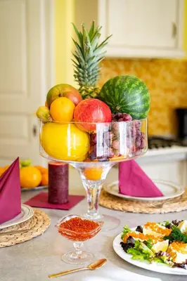 a bowl of fruit on top of a table at Royal Center Palace in Prague