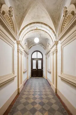 an empty hallway with a door in a building at Modern apartment in the center of Prague in Prague