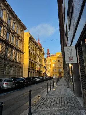 a street with buildings and a dont waste sign on it at Cozy apartment with a terrace in the center of Prague in Prague