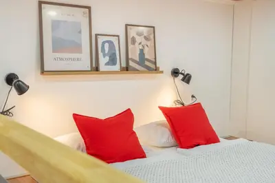 a kitchen and dining room with a table and chairs at HOMELY I Central studio I ELEVATOR I SELF CHECK-IN in Prague