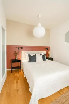 a bedroom with a large white bed and a lamp at HOMELY I Central 38m2 APT I ELEVATOR I Self Check-In in Prague