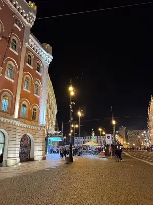 a building on a city street at night at Old Town Green Room with private bathroom in Prague