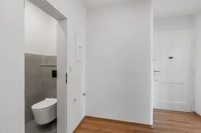 a bathroom with a sink and a mirror at Skyline Terrace Flat in Prague