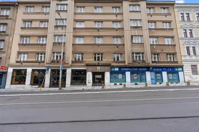 a large building on the side of a street at Skyline Terrace Flat in Prague