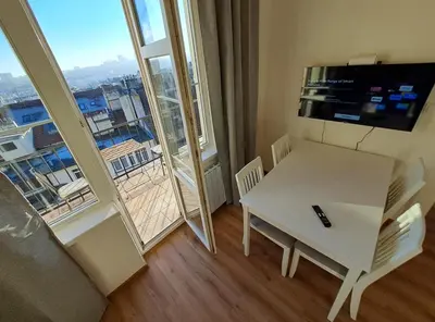 a view of a city from a balcony at Skyline Terrace Flat in Prague