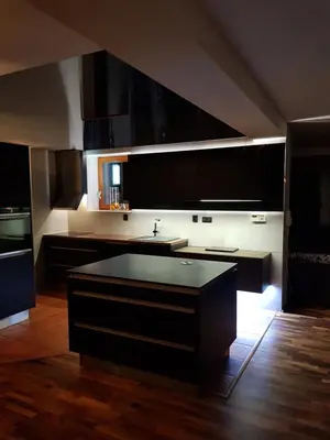 a kitchen with a sink and a counter top at Lucky 55 in Prague