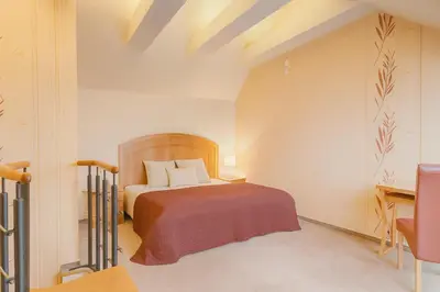 a bedroom with a bed in a room at Maisonette apartment in the center of Prague - Samcova in Prague