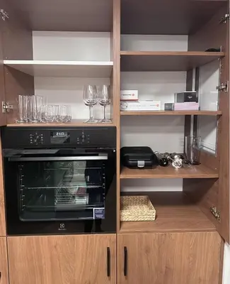 a kitchen with a black oven and wine glasses at Prague City Center 99m2 Andel Family Apartment for 6 Bath and Shower Self Check in in Prague