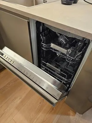 an oven with its door open in a kitchen at Bohemian Loft Apartament in Prague