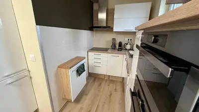 an open door in a room with a living room at Brownie Prague Design Apartment, free garage parking in Prague