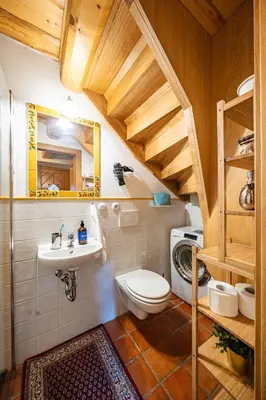 a bathroom with a toilet and a sink at Prague Days - Cozy House near Prague Castle with Desk and Balcony in Prague